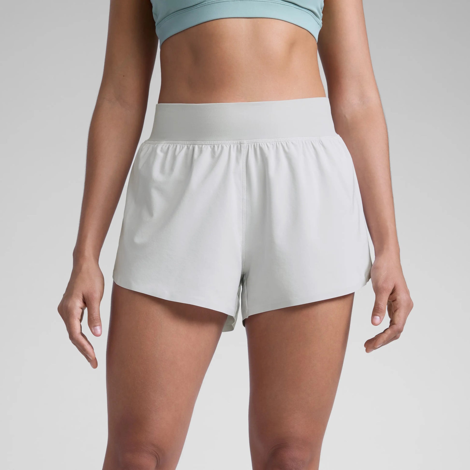 CRZ YOGA Women's High Waisted Dolphin Athletic Running Shorts with 3" High Split and Comfortable Mesh Liner for Gym and Track Workouts