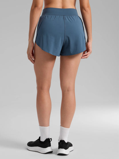 CRZ YOGA Women's High Waisted Dolphin Athletic Running Shorts with 3" High Split and Comfortable Mesh Liner for Gym and Track Workouts