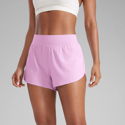 CRZ YOGA Women's High Waisted Dolphin Athletic Running Shorts with 3" High Split and Comfortable Mesh Liner for Gym and Track Workouts